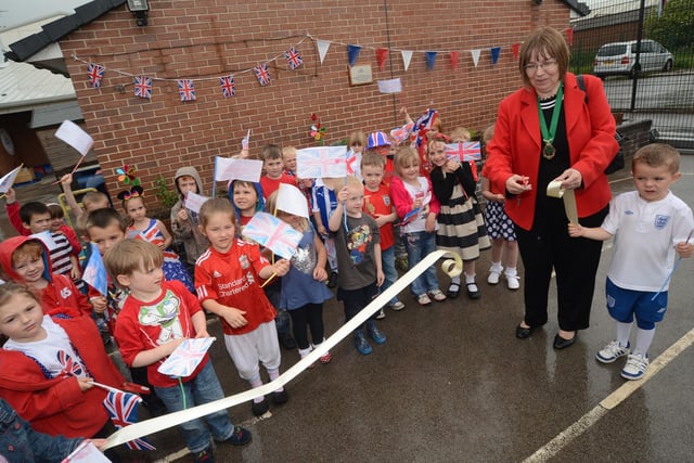 Jubilee celebrations at Norbridge Academy.  Pictured is Councillor Sybil Fielding opening the Foundation Jubilee Garden to commemorate the Queen's Diamond Jubilee  (w120531-13d)