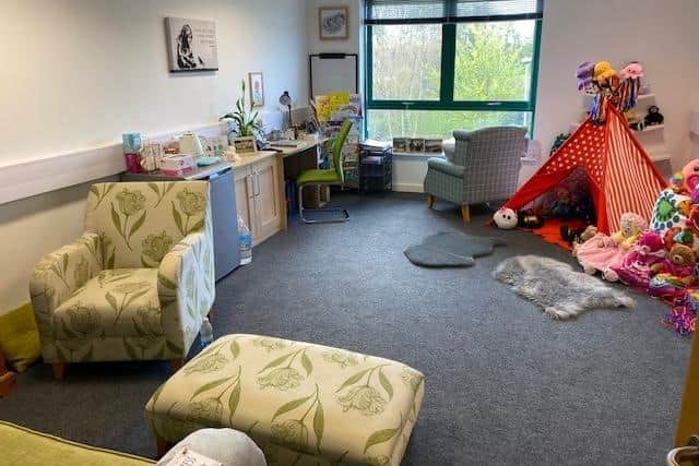 A peek inside the new counselling suite, which offers comfy seats and a play station for children.