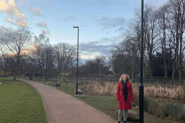 Councillor Julie Leigh with new lighting on the Canch