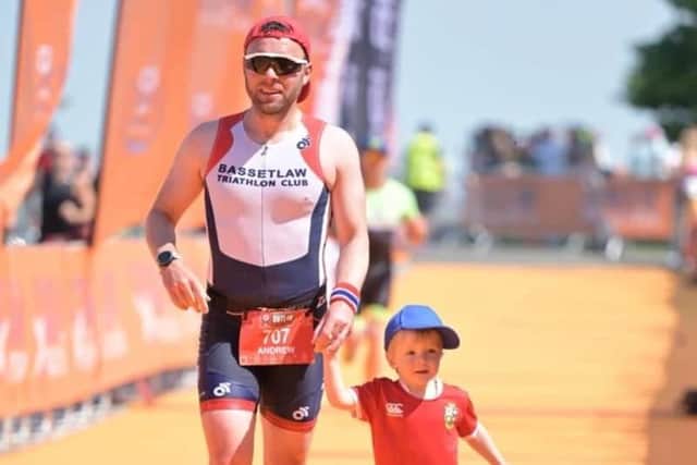 Andrew Jones finishes the race with son Alex.