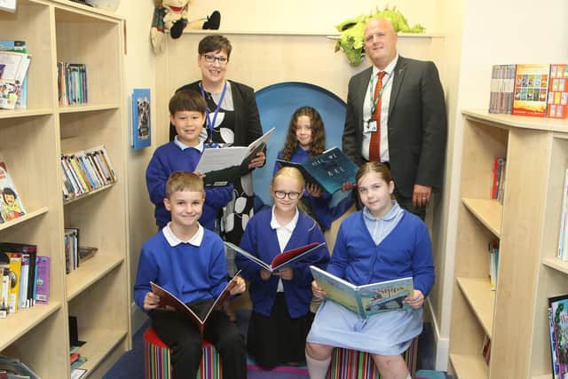 The Forge Trust CEO and former pupil Lee Hessey and St Augustine's Primary headteacher Louise Seldon, who once taught him, with year five pupils