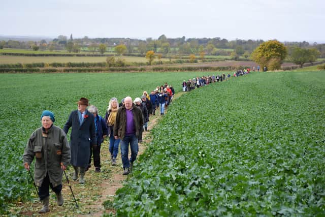 Residents took part in a walk in protest against plans for a solar farm at West Burton. (Picture: Sally Outram)
