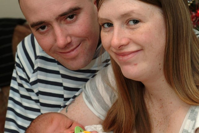Gateford Road, Worksop. Carl Dickinson and Louise Teasdale with baby Ryan Alan Dickinson. Photo taken in 2008.