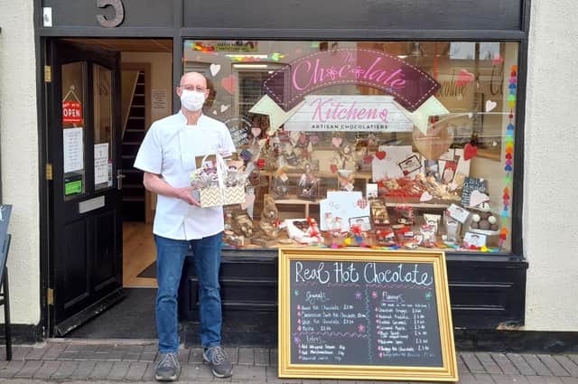 Bob with Retford's Love Bassetlaw Prize Draw Prize outside The Chocolate Kitchen on West Street.