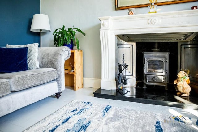 This stunning feature fireplace is a focal point of the lounge at the £260,000 North Anston property.