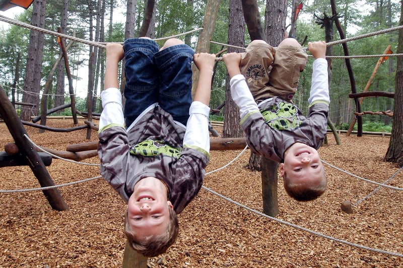 Sherwood Pines features a fun-packed play area, with a climbing frame and two tree houses to explore. Play areas, a gruffalo trail, walks and cycle routes also await families looking to make the most of the great outdoors. Car parking charges apply. Pictured are Cory Simpson, nine, and his brother  Hayden Simpson, six enjoying the adventure play area at Sherwood Pines.