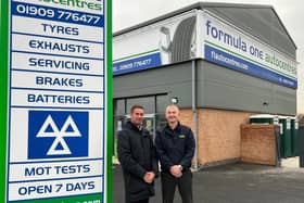 Regional manager, Chris Higgins, alongside a Formula One Autocentres employee at the new Worksop branch.