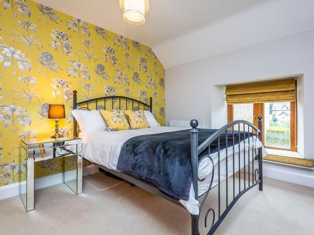 Like all the rooms at the barn-conversion house, the fourth and final bedroom is beautifully appointed.