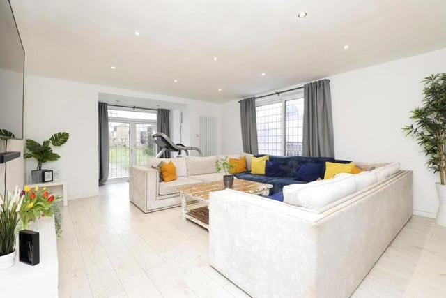 As well as the lounge, the ground floor includes this fabulous family room. Double-glazed French doors lead to the back garden, while patio doors at the side lead to the external patio area.