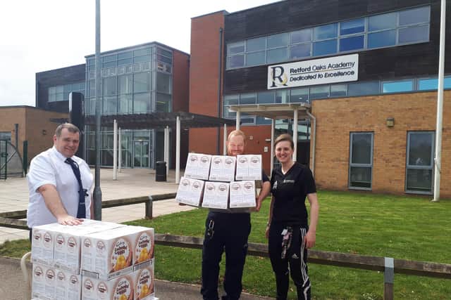 Staff from North Notts BID delivering Easter eggs to youngsters at a school