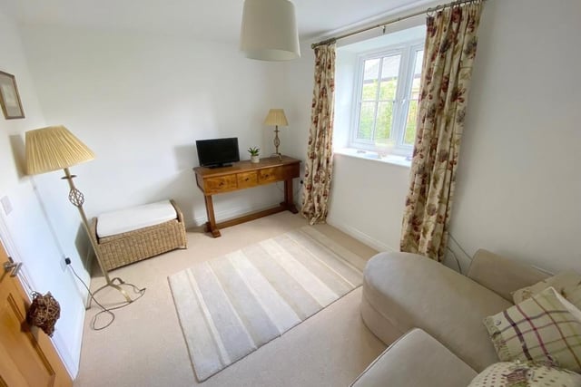 The sitting room is a sweet little space. A room to get away from it all and have a minute!