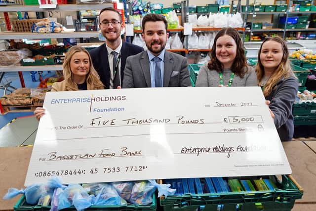 The team at Enterprise Worksop present a large cheque to Bassetlaw Food Bank. L-R Abby Connolly, Dylan Longbottom and Josh Wardell from Enterprise, and Bassetlaw Food Bank assistant manager Ellen Ryan, and fundraising manager Laura Kennedy.