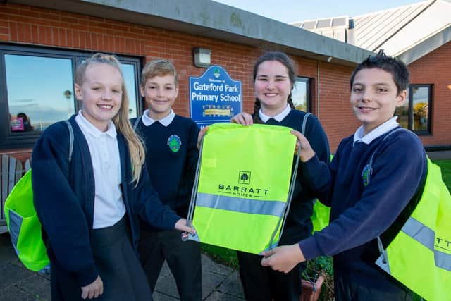 A group of pupils at Gateford Park Primary School with their new kit bags donated by Barratt Homes.