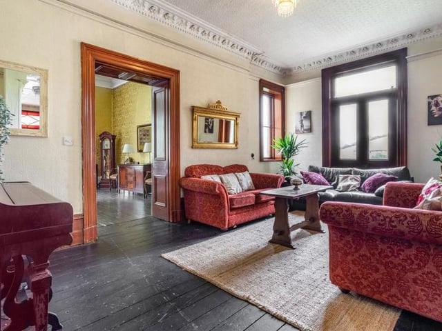 The sitting room underlines that while the manor has been modernised in recent years, it still retains lots of period character. Patio doors from the sitting room lead into the garden