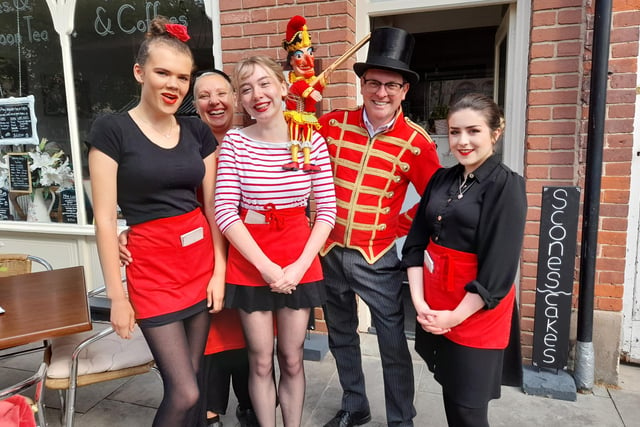 The Imperial Tearoom team have fun with Mr Punch.