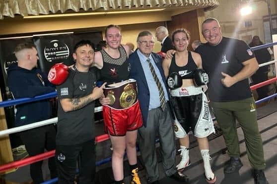 Elle Coulson displays her newly-won European belt post-fight.