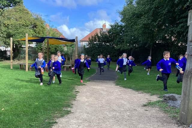 Children in Key Stage 2 had to run eight laps of the field to make up a full mile in distance.