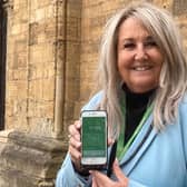 Councillor Sue Shaw pictured with the new TrailTale app, available on the app store now.