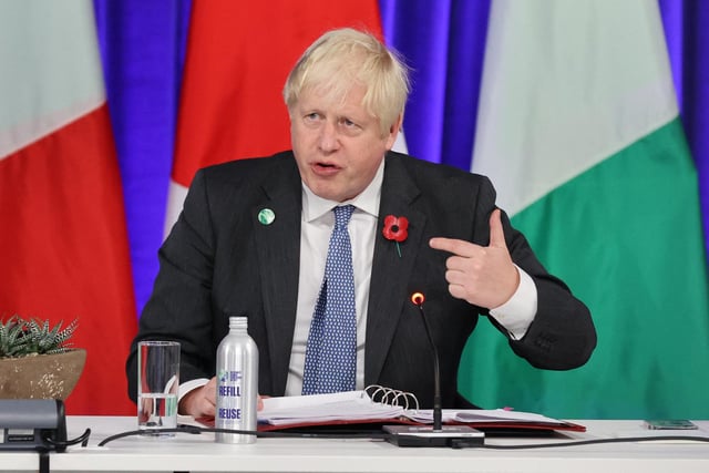 Prime Minister Boris Johnson attends a meeting on the 'Build Back Better World (B3W)', as part of the World Leaders' Summit of the COP26.