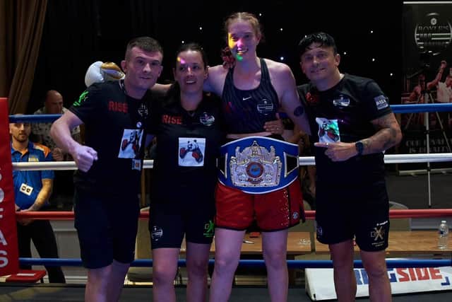 Elle Coulson celebrates her third world title.