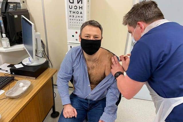 Mr Clarke-Smith said he 'wasn't expecting' to get the vaccine at Retford Hospital, otherwise he would 'have worn a t-shirt'.