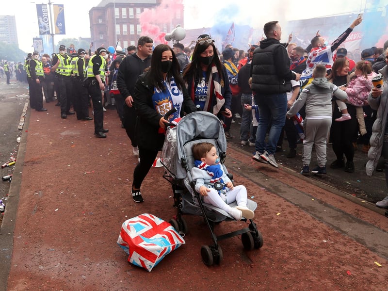 The mass gathering of fans comes despite pleas from the police, government and club to celebrate responsibly. PIC: Robert Perry/PA Wire