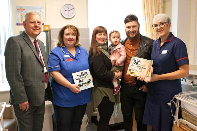 Richard Parker OBE, Chief Executive at DBTH, with Kelly, Willow and Mike Condon (centre) and two members of the Trust’s Special Care Baby Unit team.