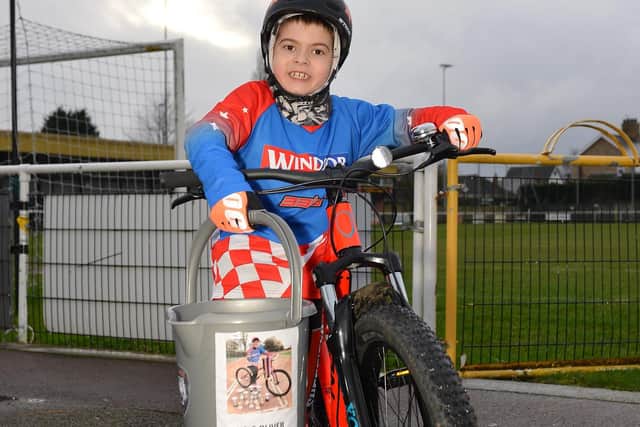 Oliver Banyard, 8, has cycled round more than 80 miles to raise money for Worksop Town