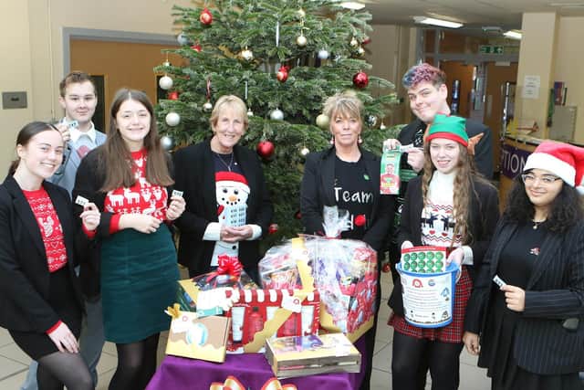 The Students Voice group from the Outwood Post 16 Centre with their fund raising raffle and Christmas jumper day.