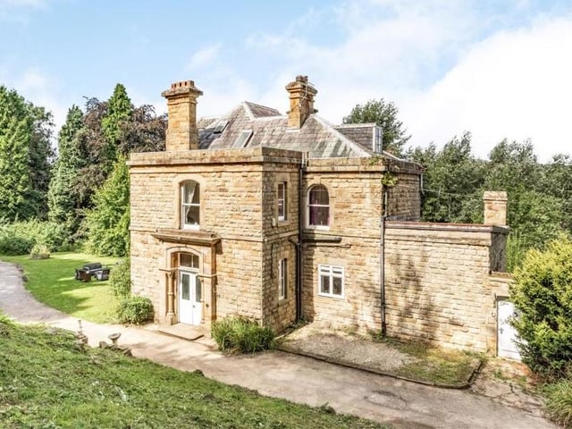 A view of the exterior from a different angle. Sitting pretty and surrounded by nature.