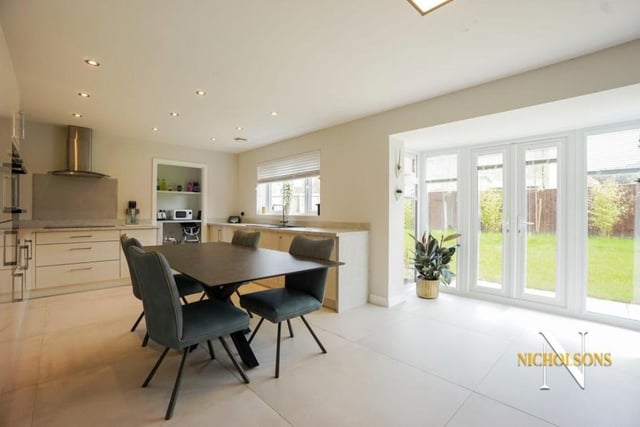 Next stop is an open-plan kitchen with dining area and living space. This is the heart of the home, providing the perfect space for family meals and for entertaining guests.