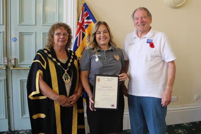 Worksop Morrisons community champion Vicky Brooks pictured with councillor Madelaine Richardson, Bassetlaw Council chairman, and David Scott, chair of Worksop RBL branch.