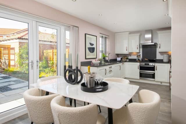B&amp;DWS - The kitchen and dining area inside the Kingsley show home at Knights View