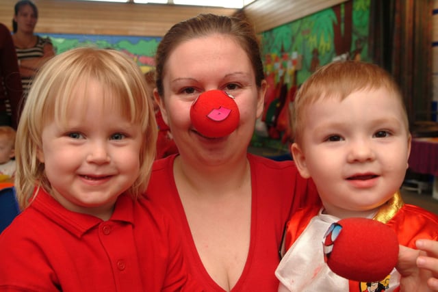 Manton Minnies dress up for red nose day. Pictured is Jessica Glover, aged three, Gemma Carroll, senior child care practitioner, Pre School Learning Alliance and Jack Keeling, aged two.