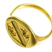 The 350-year-old gold ring displays the coat of arms of the Jenison family.  A find legendary outlaw Robin Hood would have loved to have made has been unearthed by a metal detectorist – the Sheriff of Nottingham’s gold signet ring.
