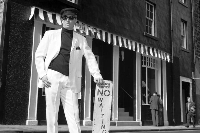 Modelling a pure white Italian suit outside clothes shop Our Man, on Rose Street, in May 1966.
