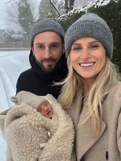 Samantha Holmes, 29 and husband Jarred, 35 with their baby, Celine.