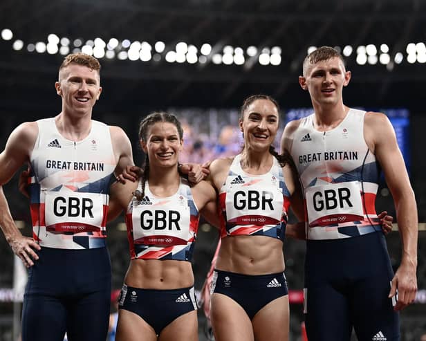 (From L) Britain's Cameron Chalmers, Zoey Clarke, Emily Diamond and Lee Thompson, pose after taking third place in a race of the mixed 4x400m relay heats during the Tokyo 2020 Olympic Games at the Olympic Stadium in Tokyo on July 30, 2021. (Photo by Jewel SAMAD / AFP).