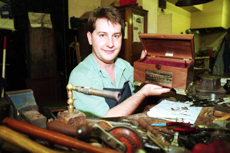 Jon Hunt, silversmith with the Edinburgh jewellers Hamilton & Inches, holding a walnut and silver casket to be presented to Sean Connery at the Freedom of the City ceremony later that year. Picture from May 1991.