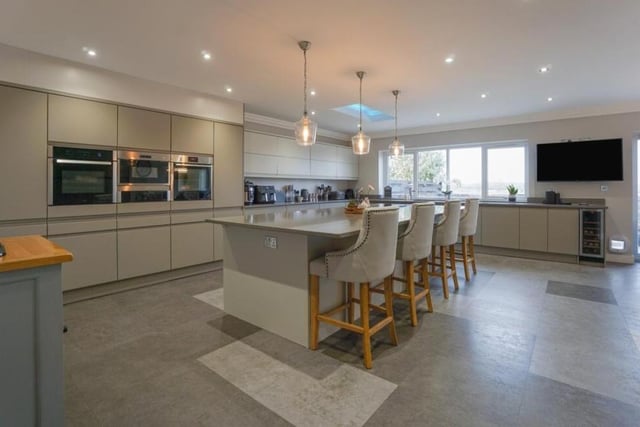 We start our tour of the £540,000 Worksop property in the focal point of the home, which is the vast kitchen/diner. It features lots of built-in appliances, including two ovens, a microwave, wine fridge and full-sized fridge with separate freezer. There is underfloor heating too.