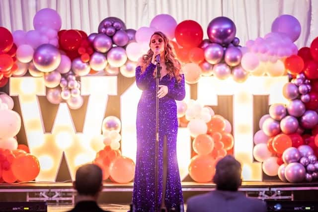 A performer sings at one of the last decade's Worksop's Got Talent events.
