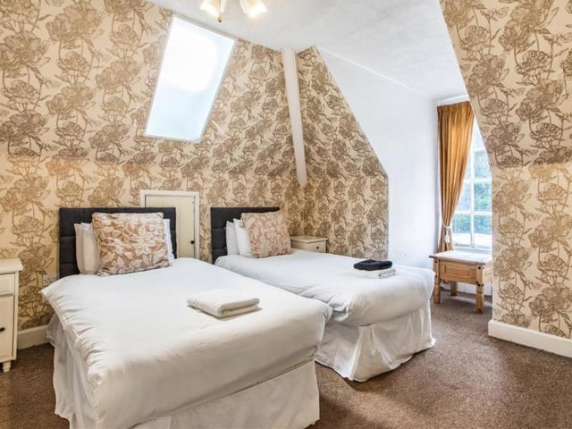 The second floor of Oakerthorpe Manor comprises two double bedrooms, both of which offer open views of the surrounding landscape and woodland. This is one of them.