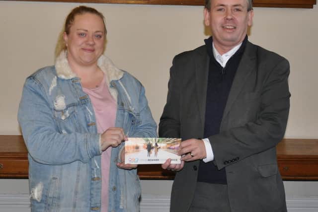 Pictured is competition winner Zoe Bird with Cabinet Member for Housing, Cllr Jonathan Slater.