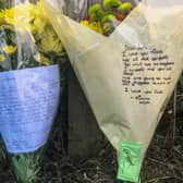 Floral tributes left after a male drowned at Ulley Country Park