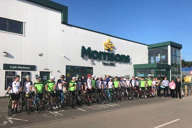 The 45 police officers pictured as they prepared to set off from Morrisons in Worksop