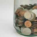 Stock photo glass Money bottle. Saving pennies