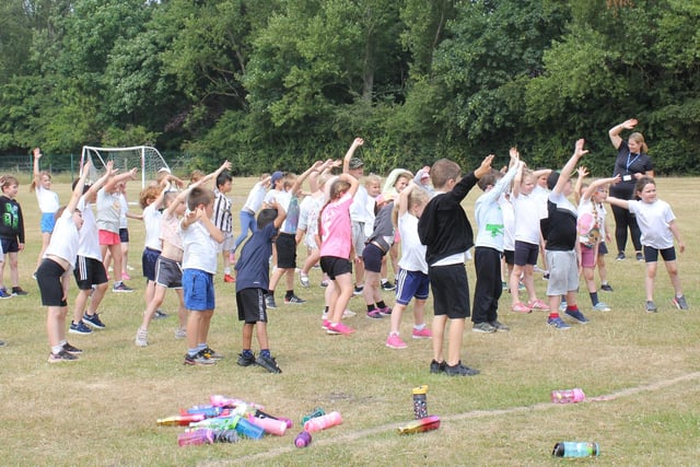 The children at St Joseph's were provided with a thorough warm-up ahead of the fun run for the Children's Heart Unit Fund.