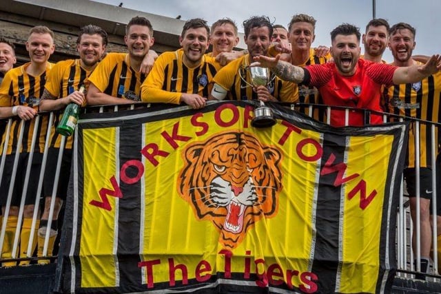 The players celebrate lifting the 2018/19 NCEL league title.