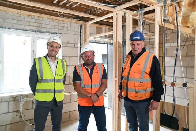 Adam Champion, Paul Phillips and Shaun Keown at the 'pre-plaster' visit. (Photo by: Bellway Homes)