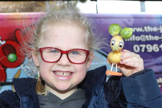 Maisie Edwards, aged six, with her vegetable animal that she made at the food and drink show.